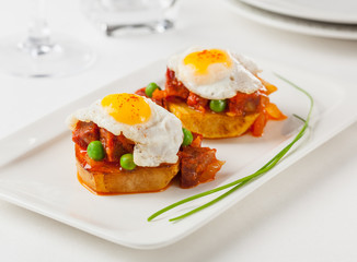 Fried eggs and chorizo