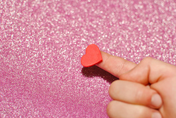 red heart on the child's finger