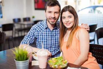 Beautiful Hispanic couple at a restaurant