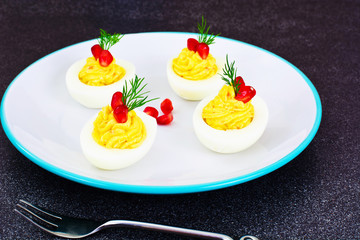 Tasty Stuffed Eggs with Pomegranate