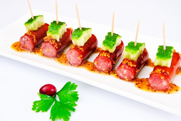 Cocktail Sausage and Cucumber on Plate