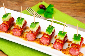 Cocktail Sausage and Cucumber on Plate
