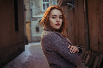 Obraz premium Beautiful woman with red hair