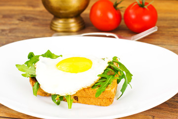 Scrambled Eggs with Arugula on Whole Grain Bread