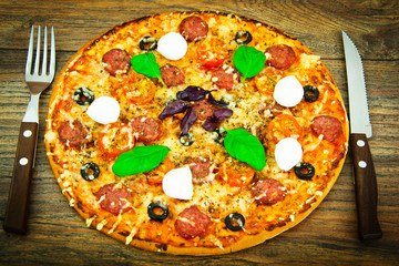 Raw Pepperoni Pizza with Sausage, Cheese, Mozzarella, Olives and