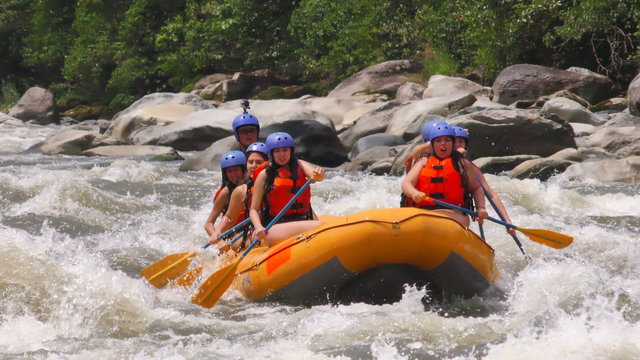 Experience the thrill of extreme white water river rafting with a group of six stunning and adventurous young women,confidently sporting only their stylish underwear.