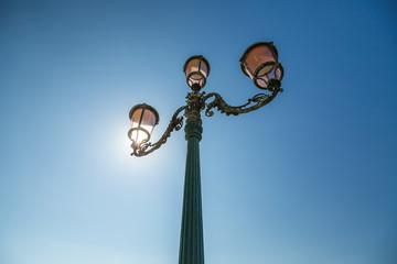 Fototapeta na wymiar Venetian lantern and blue sky, Venice, Italy