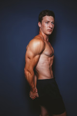 Fototapeta premium Man showing sports figure