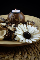 candle and dry flowers