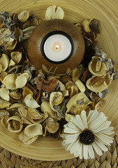 candle and dry flowers