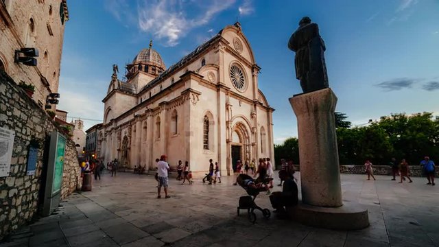 SIBENIK, CROATIA - August 13 2015: 15th Century Sibenik Cathedral has been a UNESCO World Heritage Site since 2000. Time lapse of front.