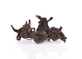 dried hibiscus sabdariffa or roselle fruits on white