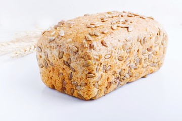 bread with sunflower seeds on a white background