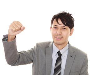 ガッツポーズのビジネスマン