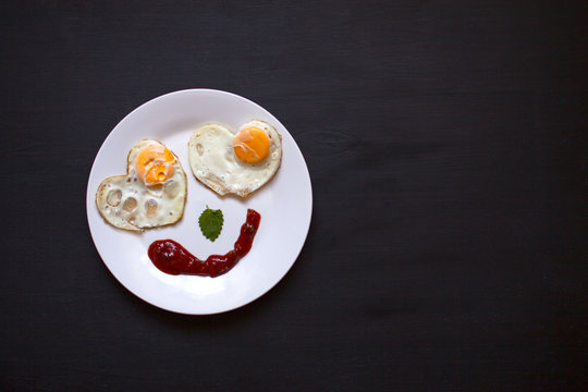 Breakfast, fried eggs in the shape of hearts, smiley,bright morn