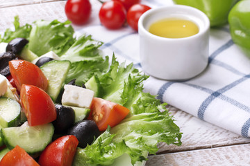 Greek salad in red boul