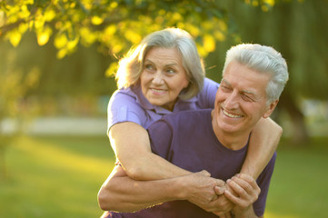 mature couple   in summer park