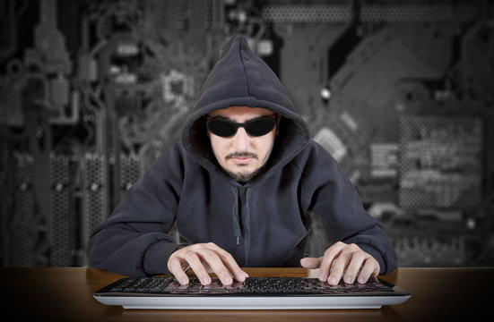Computer Hacker With Digital Background