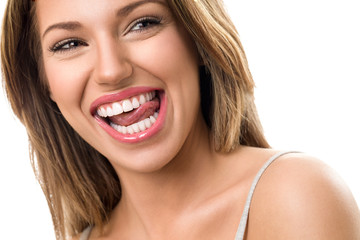 Gorgeous woman with beautiful teeth - obrazy, fototapety, plakaty