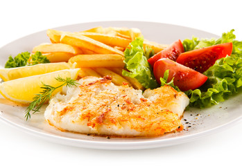 Fish dish - fried fish fillet and vegetables 