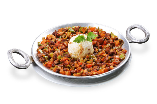 Turkish stew/meal with meat and rice, sacta pilavla beraber türlü - white background