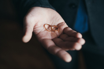 tossing up wedding rings