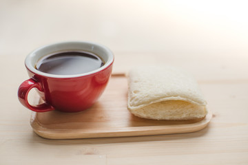 Tuna sandwich and coffee red cup with copyspace for text.