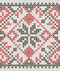 Ukrainian ethnic ornament - cross-stitch on a mesh background