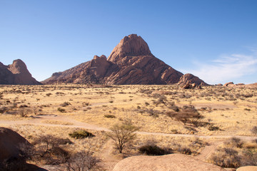 Fototapeta na wymiar Looking Over Namib Desert with Spitzkoppe Mountain.