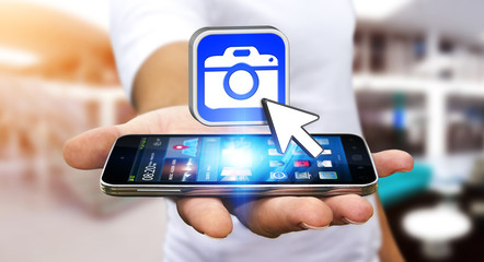 Young man using modern camera application