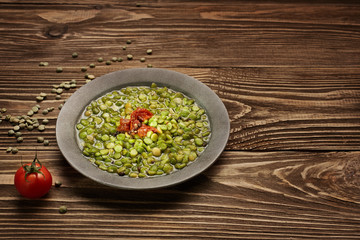 Green lentil soup with dried tomato
