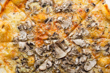 Pizza with ham, pepper and olives.