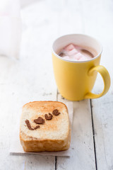 Love message on Bread sliced and chocolate cup and marshmellows