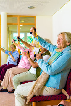Senior women doing a workout in a gym.