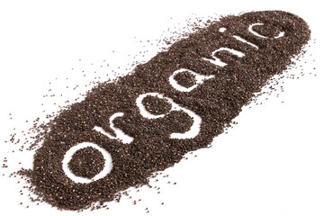 chia seeds. organic word from chia seeds isolated on white. selective focus