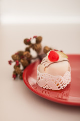 Italian cassata on a red plate