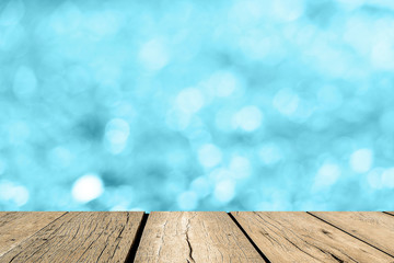 Blue Empty perspective room with sparkling bokeh wall and wooden