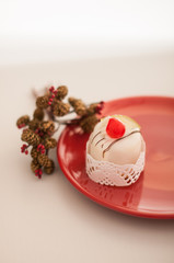 Italian cassata on red plate