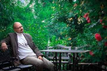 Fototapeta premium old man siting in park