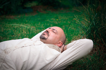 man with a straw on grass