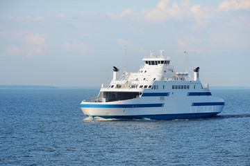 Fototapeta premium Ferry sailing in the bright sunny day