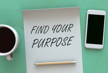 Find Your Purpose, message on paper, smart phone and coffee on table