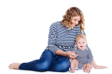 Portrait of happy mother with baby on a white background.