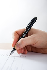 Businessman's hand signing papers. Lawyer, realtor, businessman 