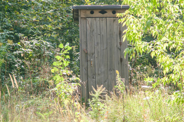 wooden outside toilet facilities