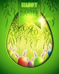 Easter background with eggs in grass and weeping willow.