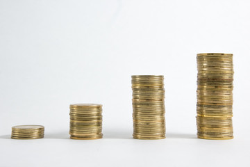 Columns of golden and silver coins isolated on white background. Money concept, investment bank