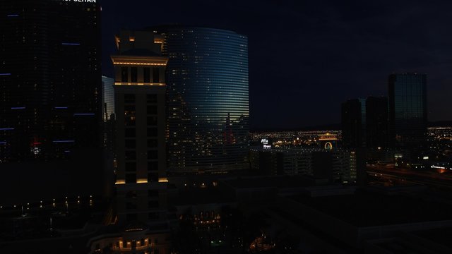 Sunset time lapse of luxury hotel The Cosmopolitan, Las Vegas, USA. The Cosmopolitan is a luxury resort located on the Las Vegas Strip with 2,995 rooms and 75,000 sq feet casino 