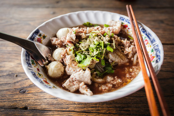 Thai noodle with soup on the table