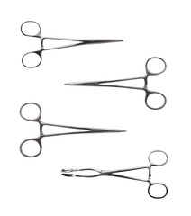 Close up of four different stainless steel surgical forceps